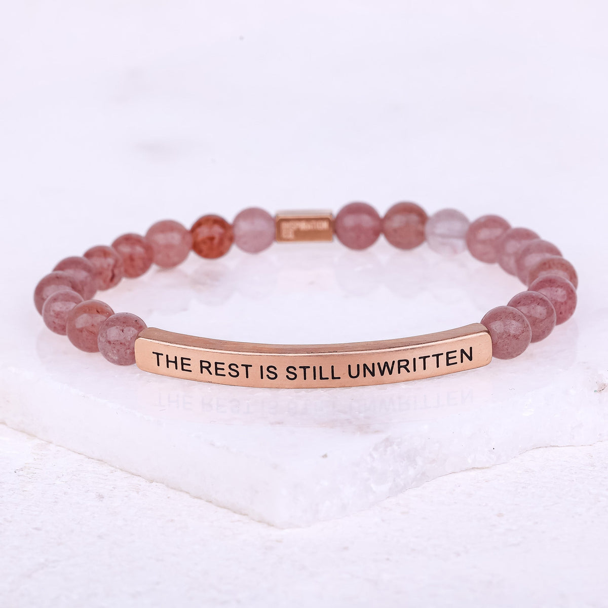 The Rest Is Still Unwritten inspirational bracelet displayed as a thoughtful gift for a loved one