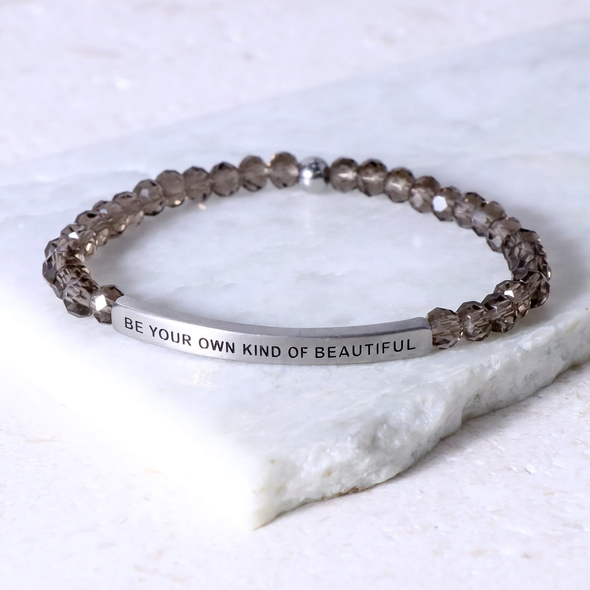 Inspiring jewelry with engraved message bar