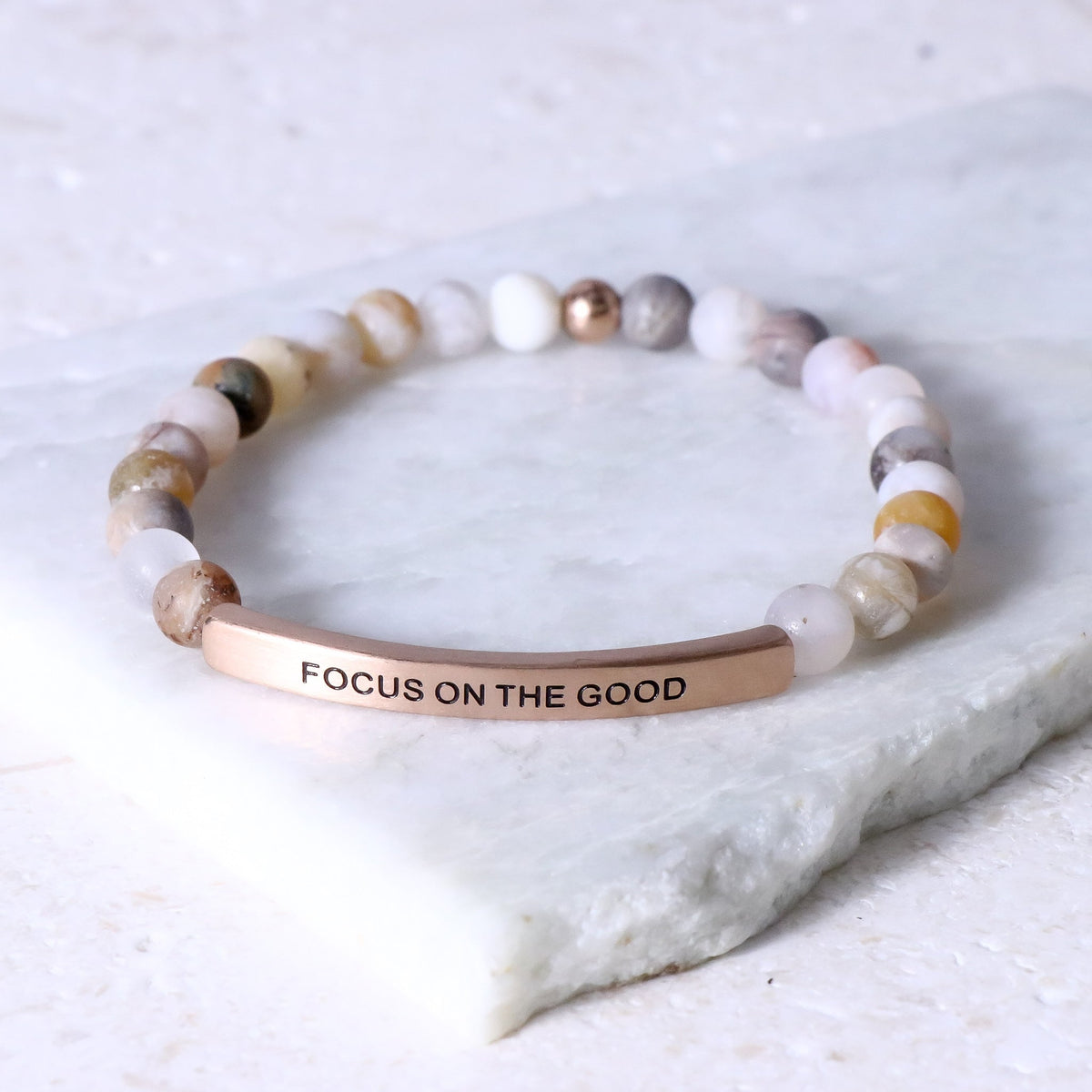 Earth stone beaded engraved bracelet