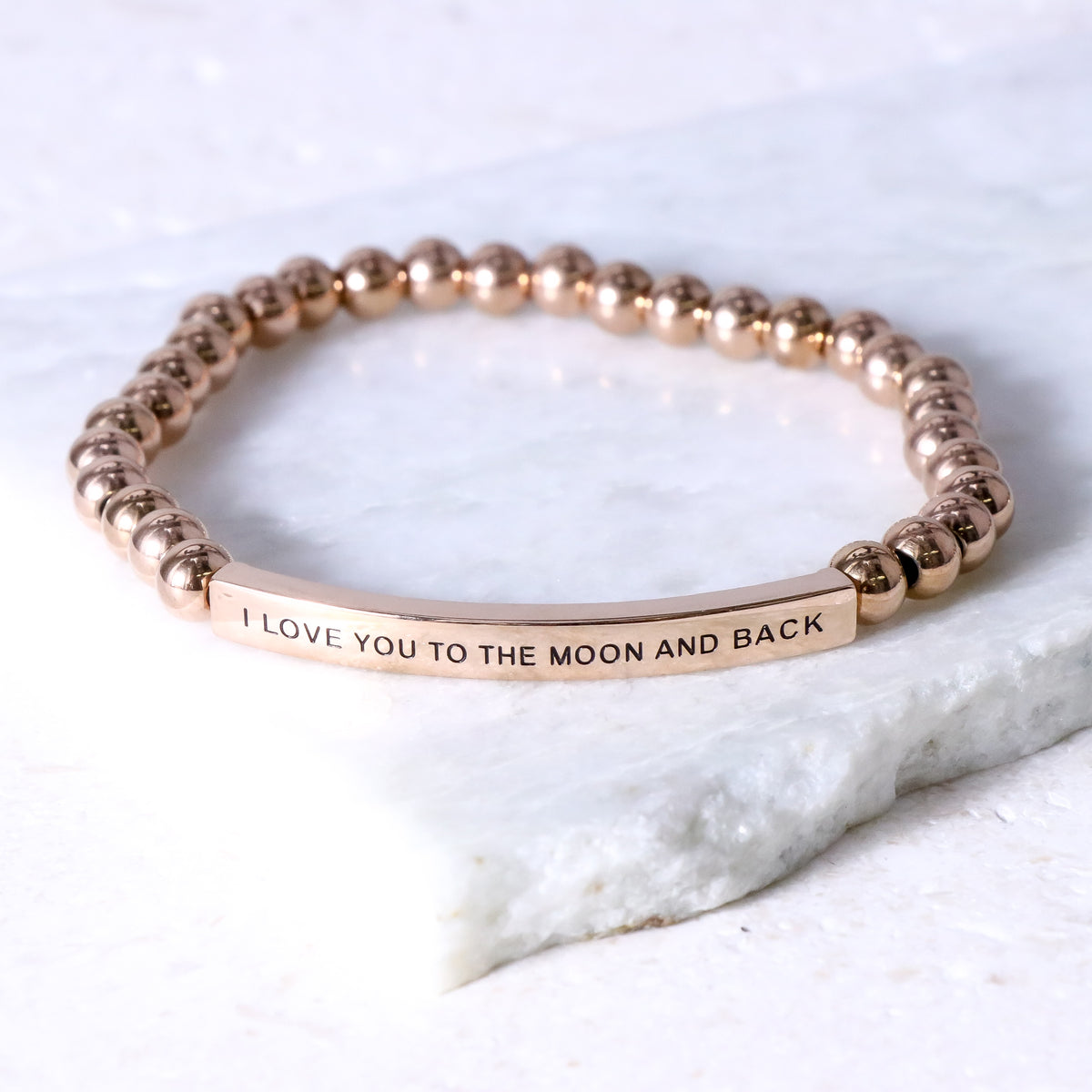 Heartfelt gift bracelet featuring the I LOVE YOU TO THE MOON AND BACK message