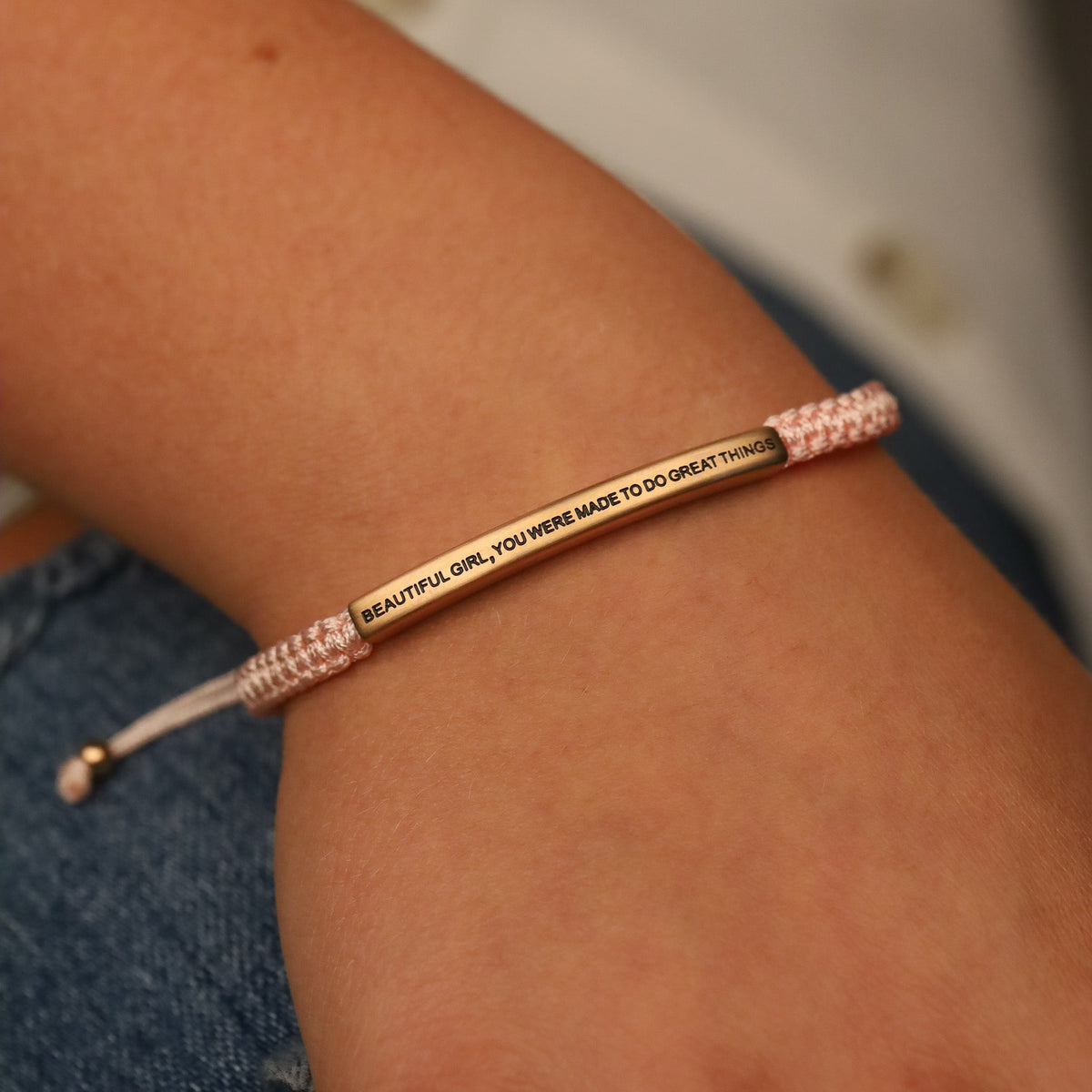 Pink rope engraved bracelet with adjustable sizing