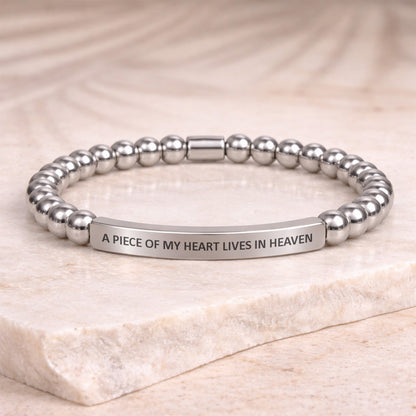 Silver engraved beaded bracelet