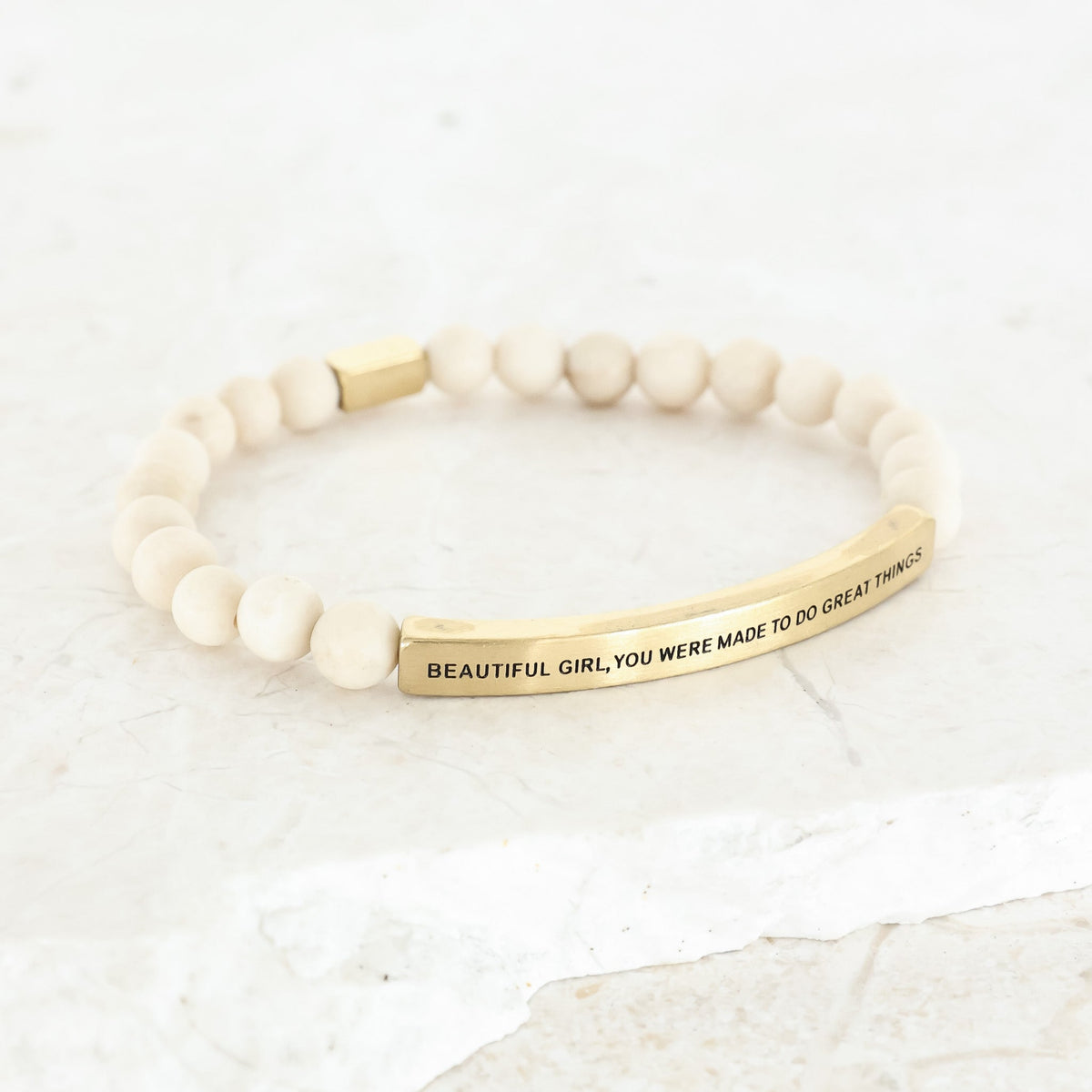 Beaded stretch bracelet with engraving