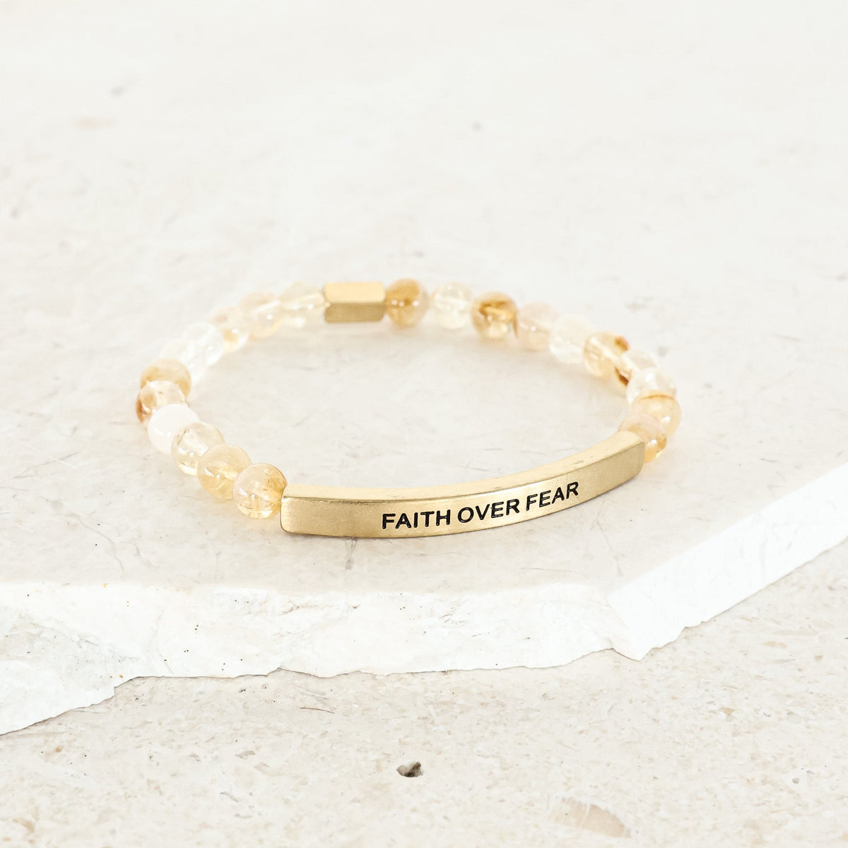 Engraved earth stone bracelet