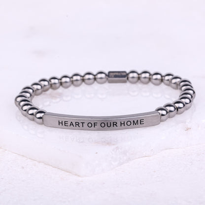 silver beaded engraved bracelet