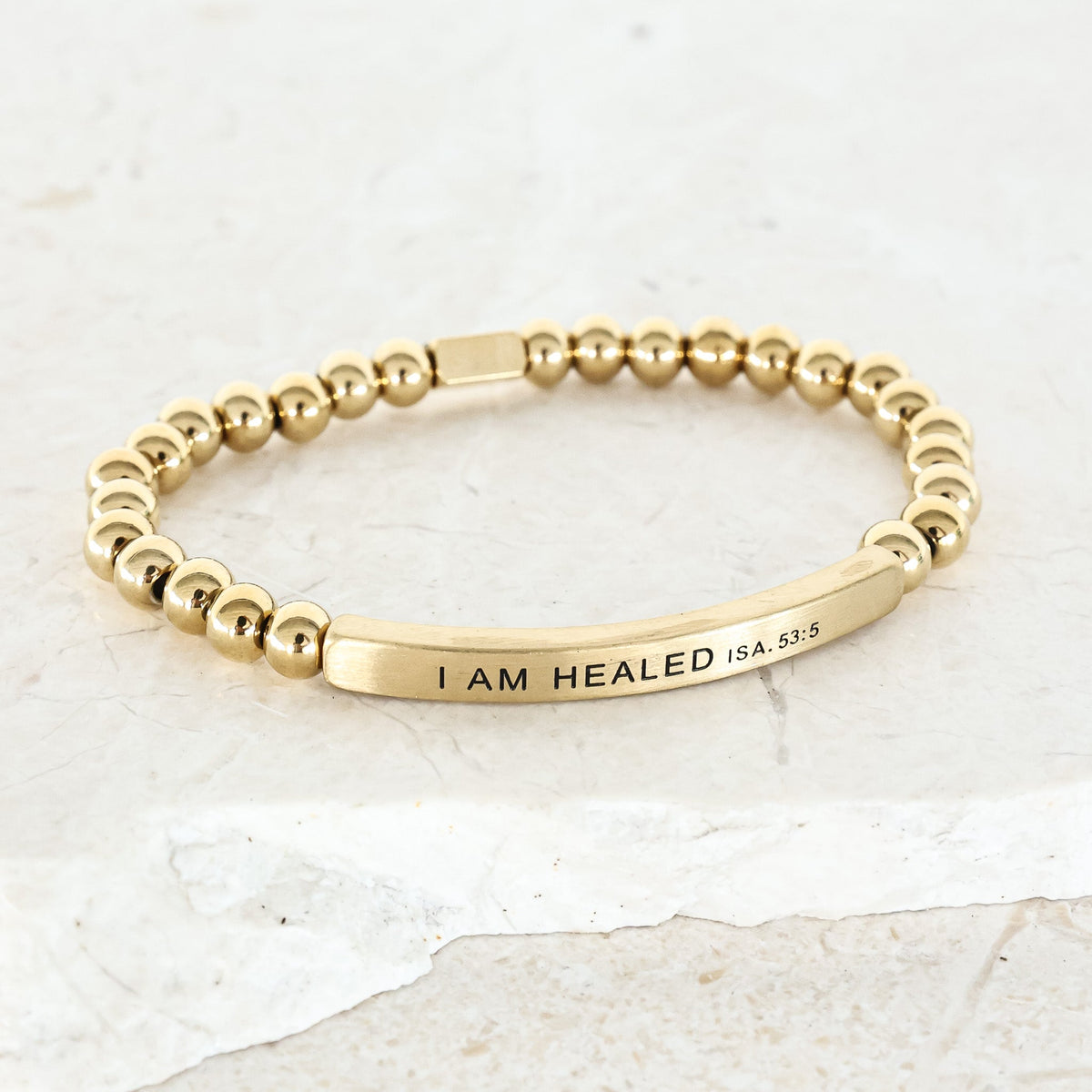 gold beaded bracelet with engraving
