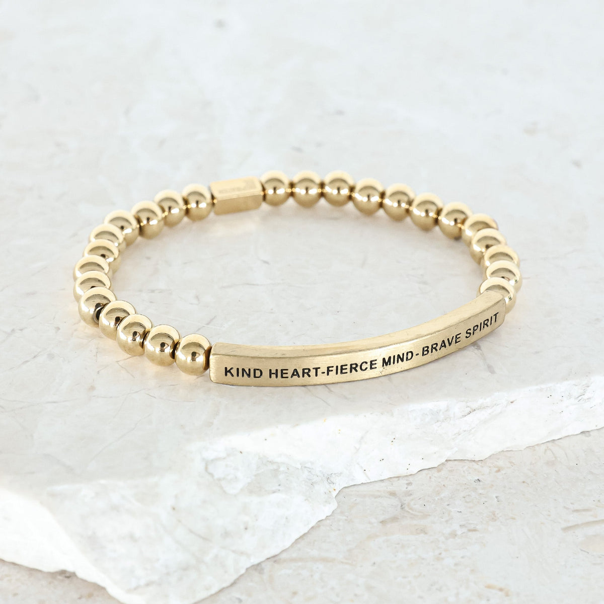 gold engraved beaded bracelet