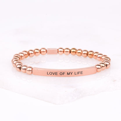 Beaded bracelet engraved with “Love of My Life”