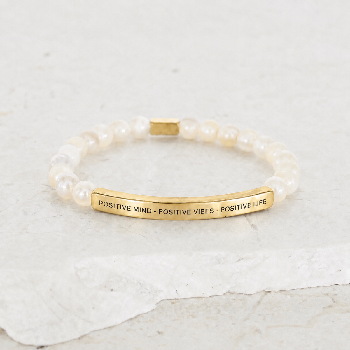 beaded pearl bracelet with engraved positive message