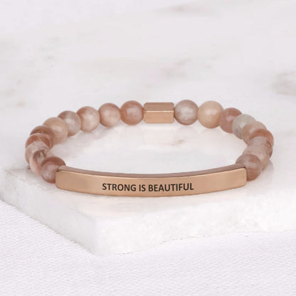 Strong Is Beautiful jewelry designed to inspire confidence, strength, and positivity