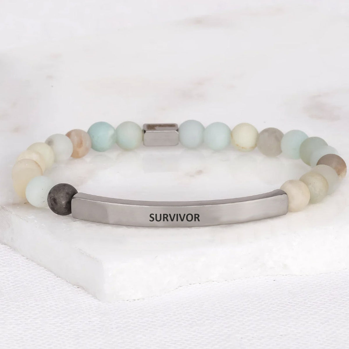 SURVIVOR inspirational beaded bracelet with engraved message and natural gemstone beads