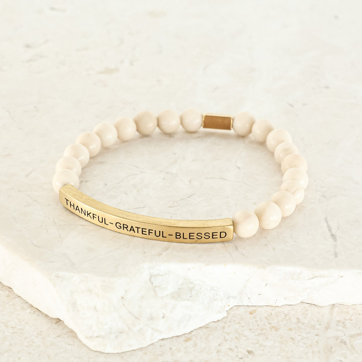 Faith-inspired beaded bracelet featuring the message Thankful Grateful Blessed