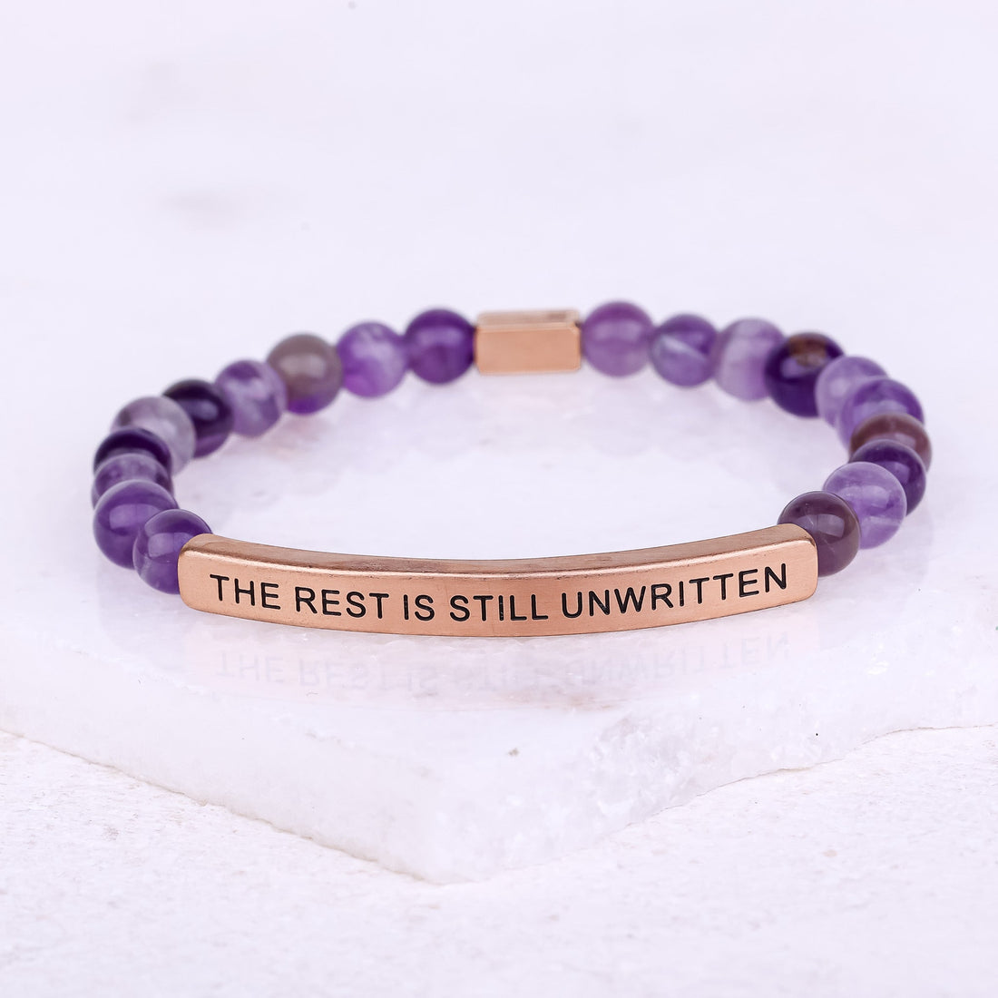 purple beaded engraved bracelet