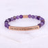purple beaded engraved bracelet