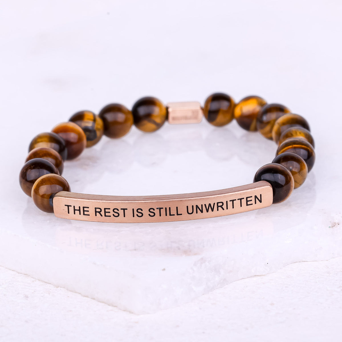 The Rest Is Still Unwritten motivational bracelet celebrating new beginnings and future possibilities