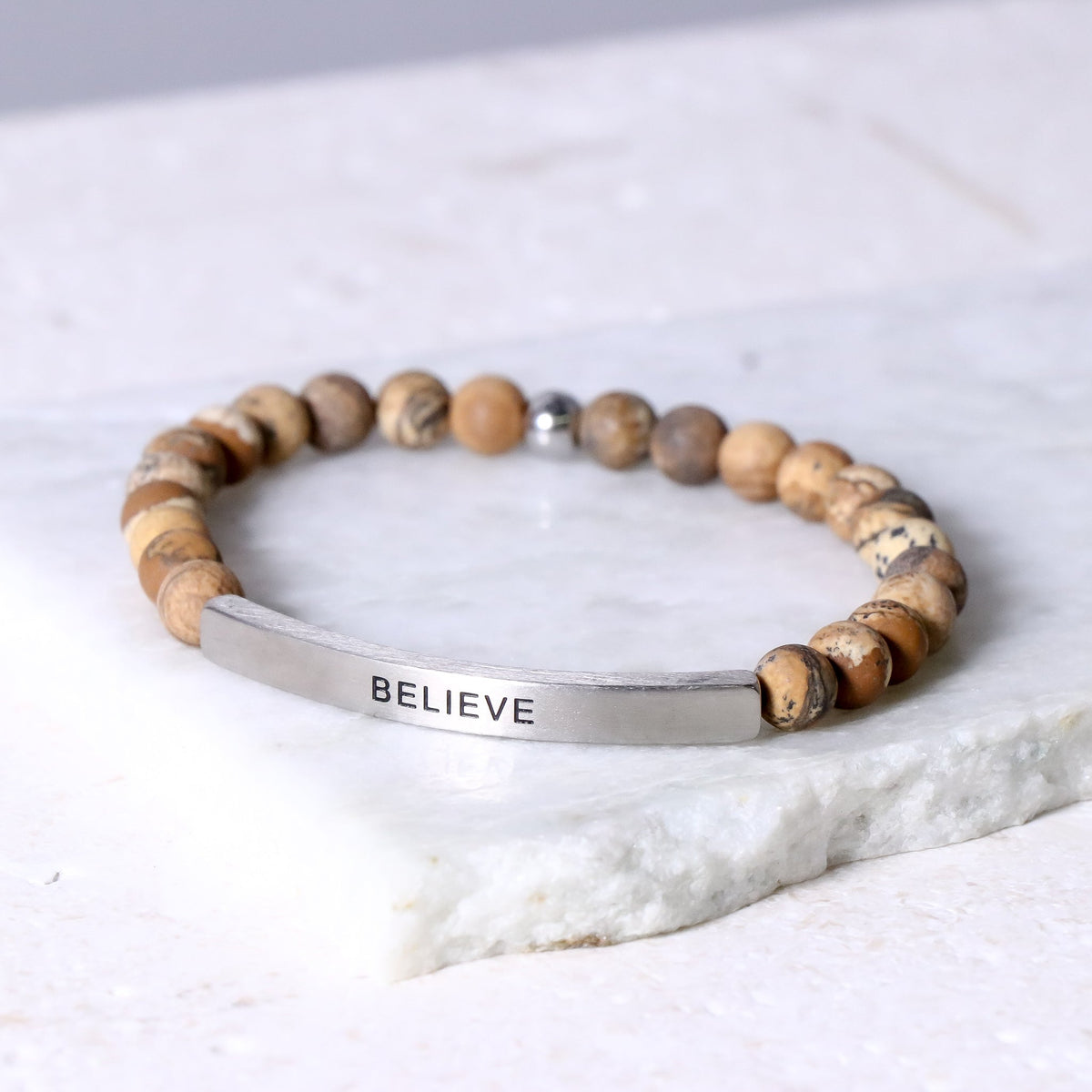 Beaded bracelet with inspirational engraving