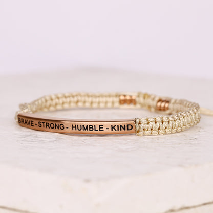Adjustable rope bracelet with engraved message