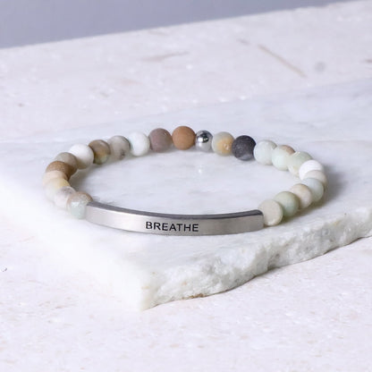 Turquoise beaded engraved bracelet