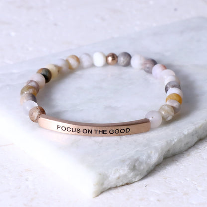 Earth stone beaded engraved bracelet