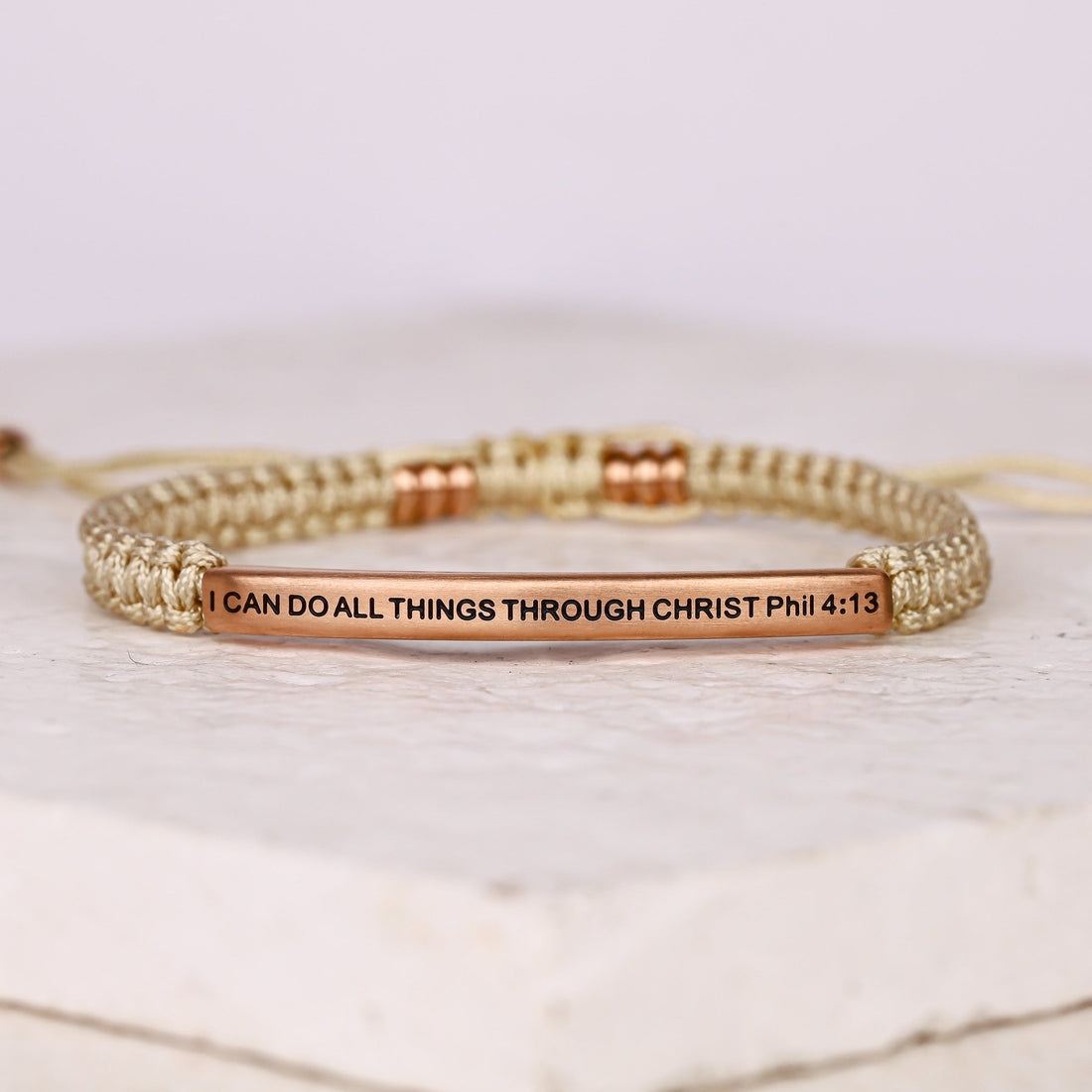Tan rope bracelet with engraved message