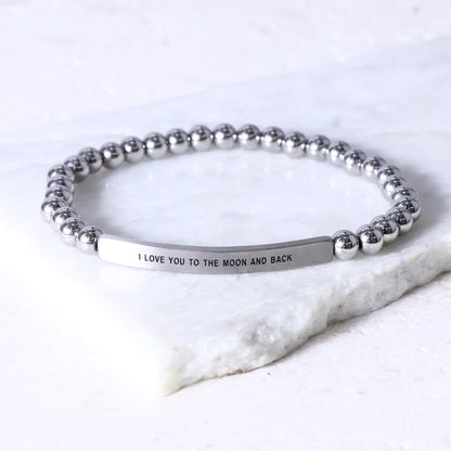 Meaningful love bracelet engraved with I LOVE YOU TO THE MOON AND BACK