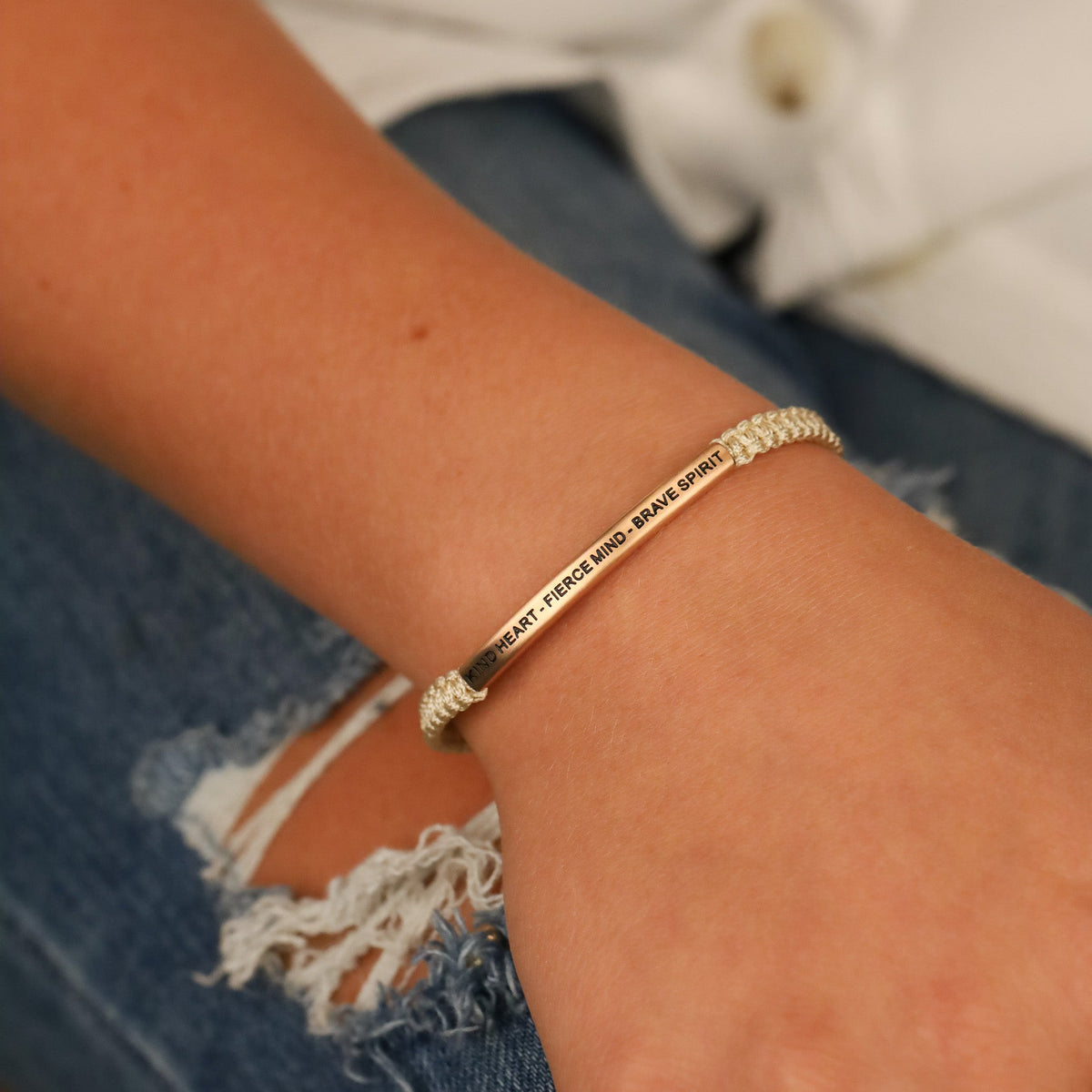 Empowerment rope bracelet with inspirational message for confidence and courage