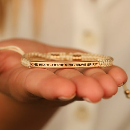 Inspirational rope bracelet celebrating kindness, confidence, strength, and courage