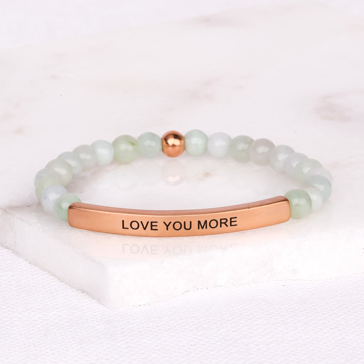 Romantic beaded bracelet with LOVE YOU MORE engraved message