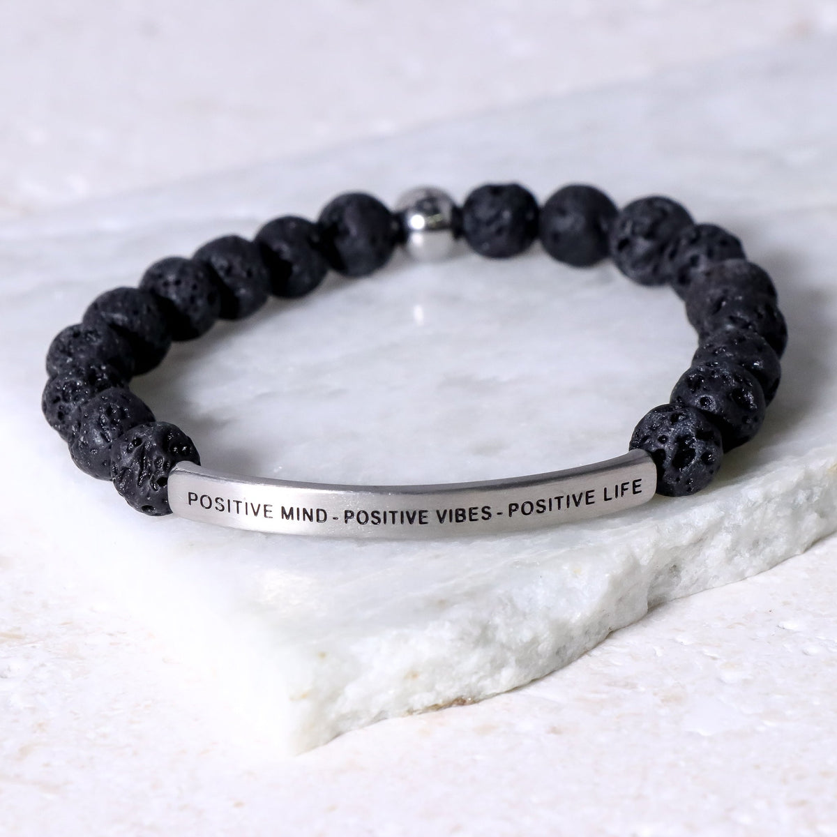 Beaded inspirational bracelet engraved with “Positive Mind Positive Vibes Positive Life”
