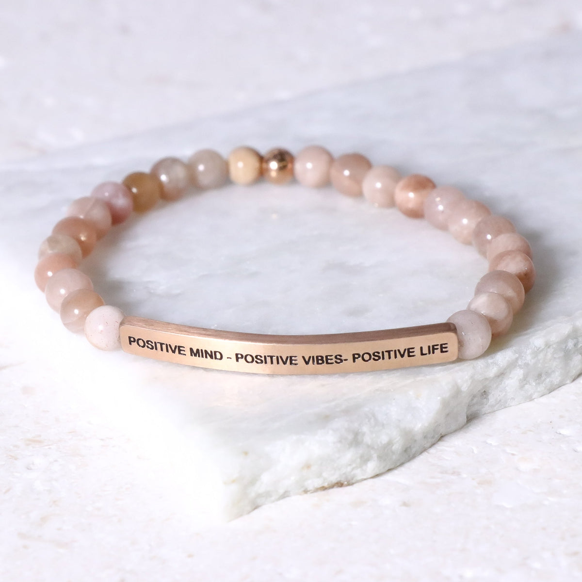 Beaded inspirational bracelet engraved with positive message