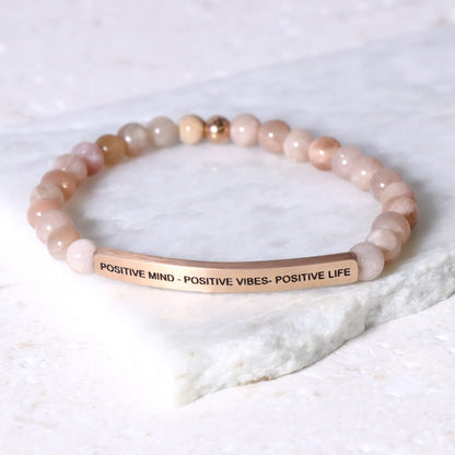 Beaded inspirational bracelet engraved with positive message