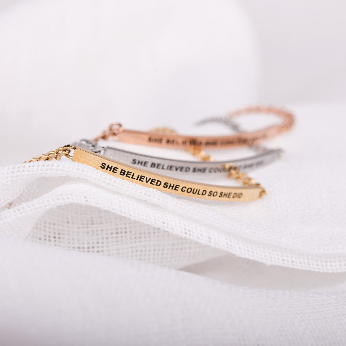 Chain bracelet engraved with “She Believed She Could So She Did”