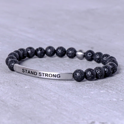 Stand Strong motivational bracelet for men featuring an engraved stainless steel message bar
