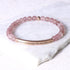 pink beaded engraved bracelet