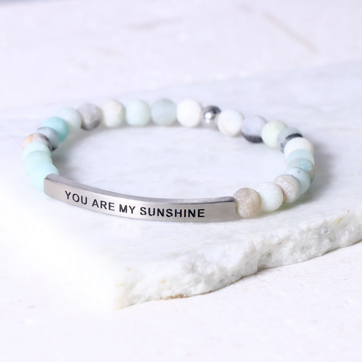 You Are My Sunshine bracelet featuring an engraved inspirational message celebrating love and happiness
