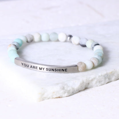 You Are My Sunshine bracelet featuring an engraved inspirational message celebrating love and happiness