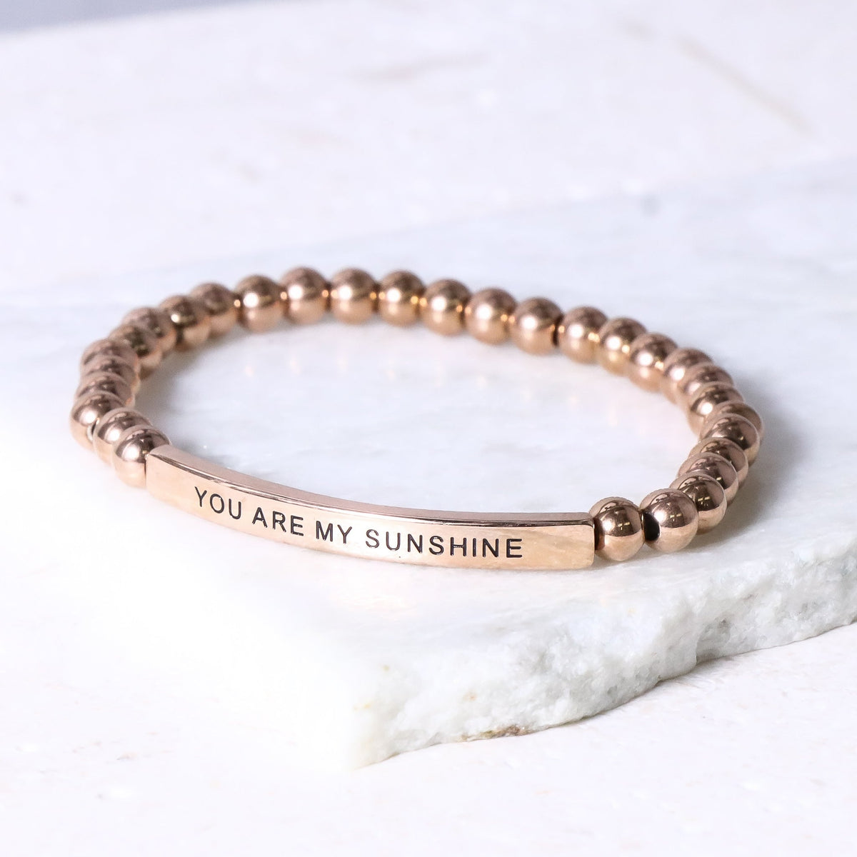beaded bracelet with inspirational message bar and natural gemstone beads