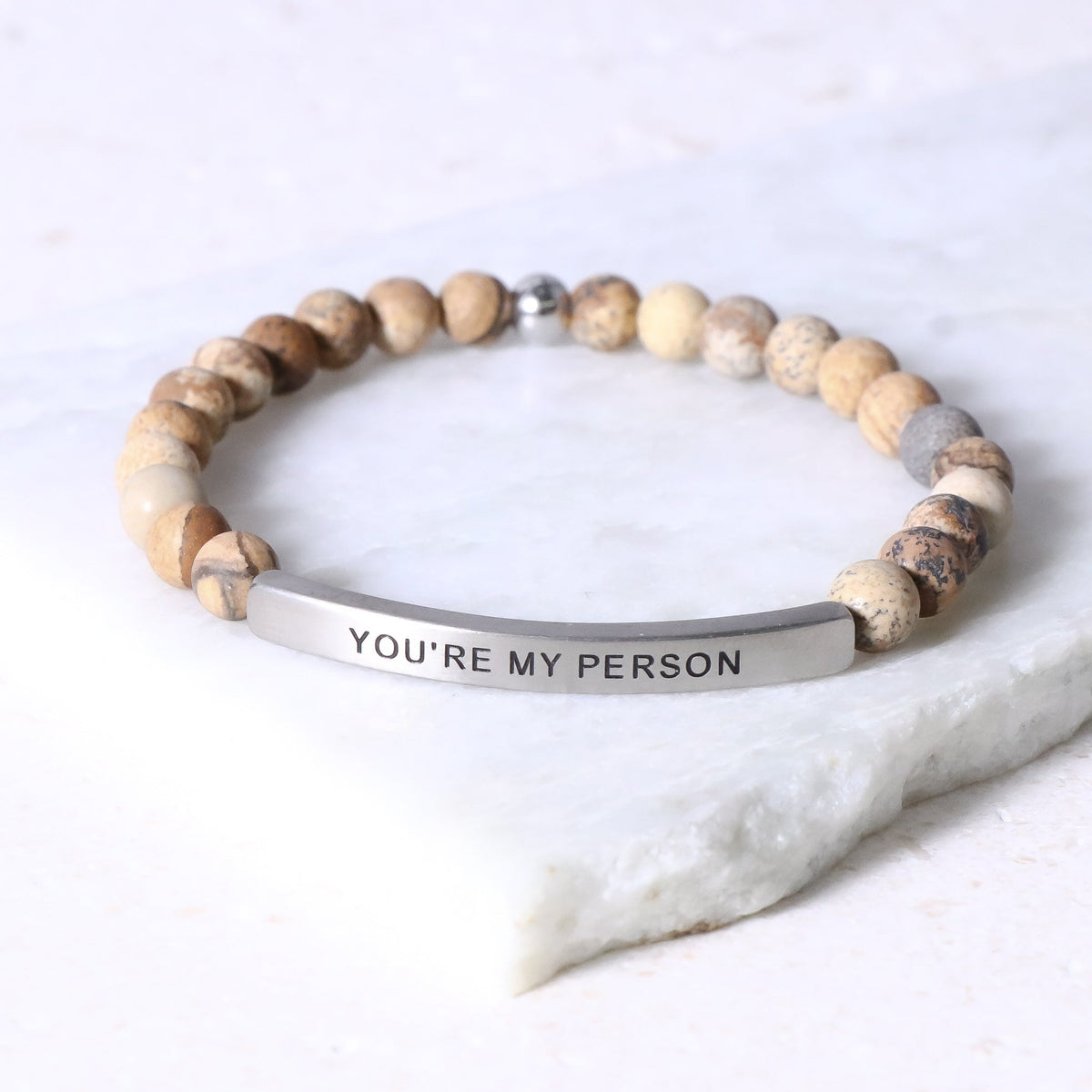  inspirational bracelet featuring an engraved message celebrating  love